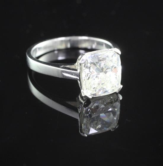 A platinum and solitaire diamond ring, size M.